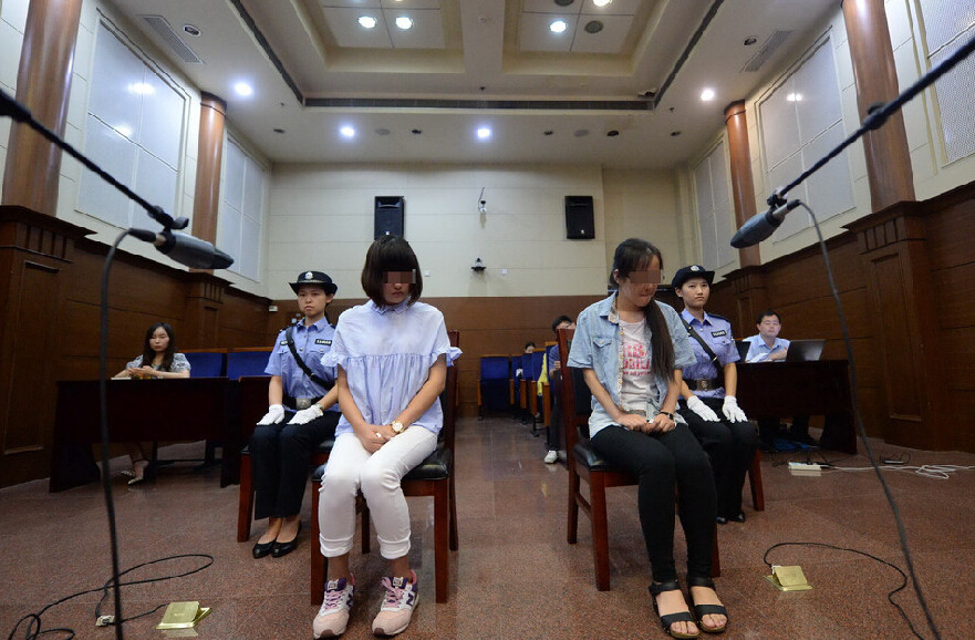 王红和李艳因犯代替考试罪,被门头沟法院分别判处