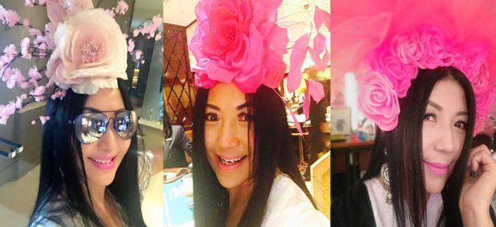 杨二车娜姆经常喜欢带一些巨大的花朵装饰,一头长发披肩.